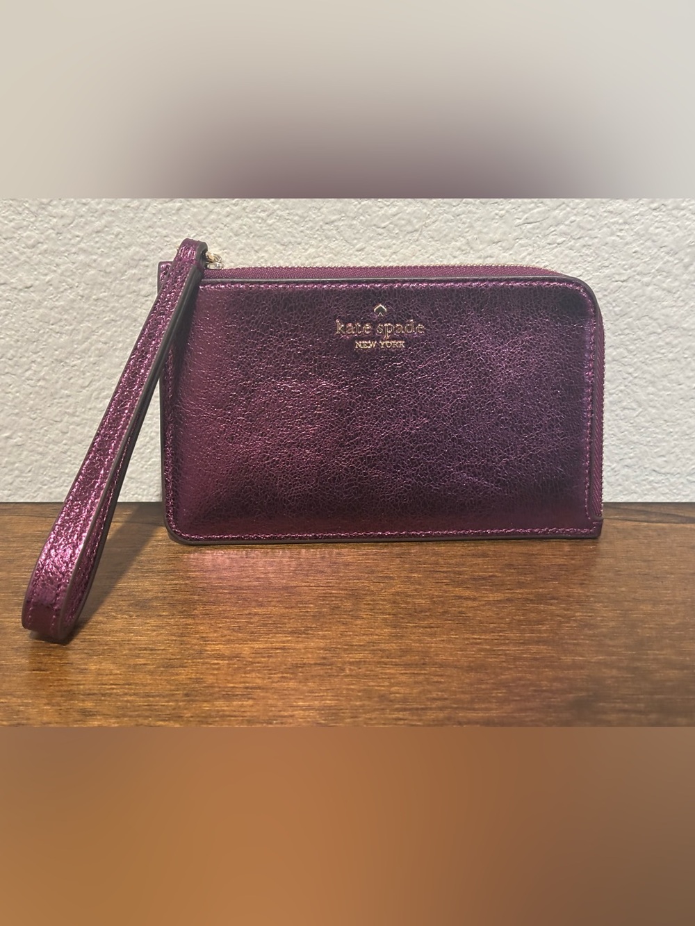 kate spade Metallic Plum Wristlet in Shimmery Wine